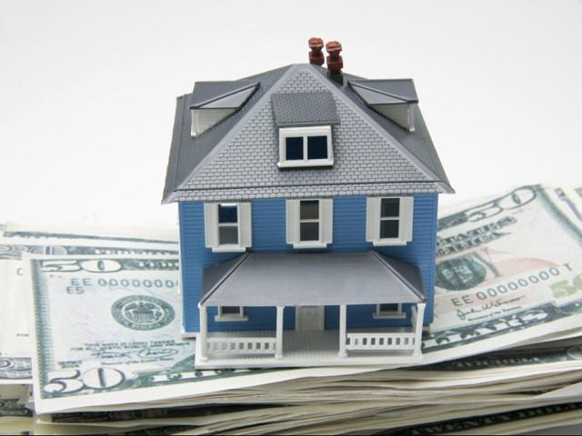 Дом в ипотеку стоит на пачке долларов